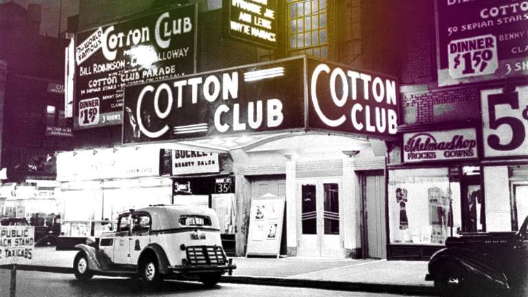 A photo of a street view of the Cotton Club, featuring its main building sign and nearby billboards promoting performers at the venue. Two old-fashioned vehicles—one white and one black—are parked on the street. The black and white photo has been modified so the top half of the image has colorful tints in pink, green, yellow, and orange tinting the billboards.