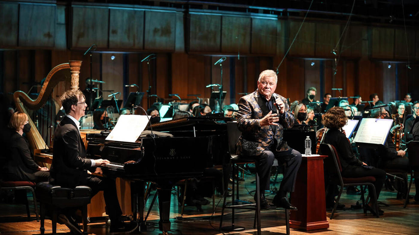 William Shatner perfoming with NSO and Ben Folds on the piano.